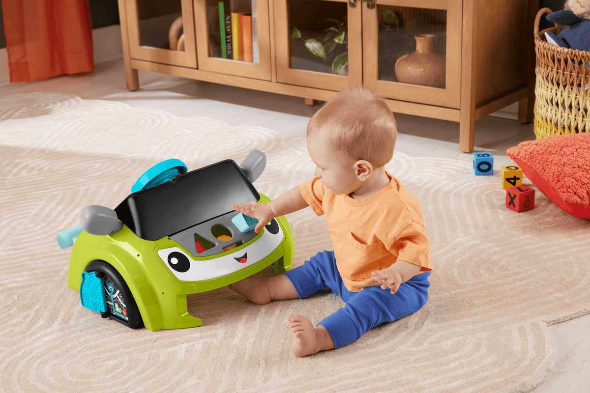 Fisher-Price Laugh & Learn Sit & Steer Driver Activity Center Baby & Toddler Learning Toy, Multilanguage Version